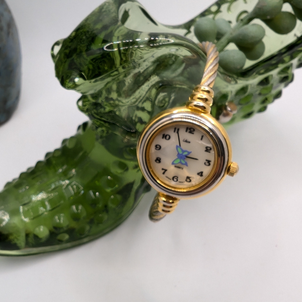 Ladies gold and silver tone quartz butterfly bracelet watch